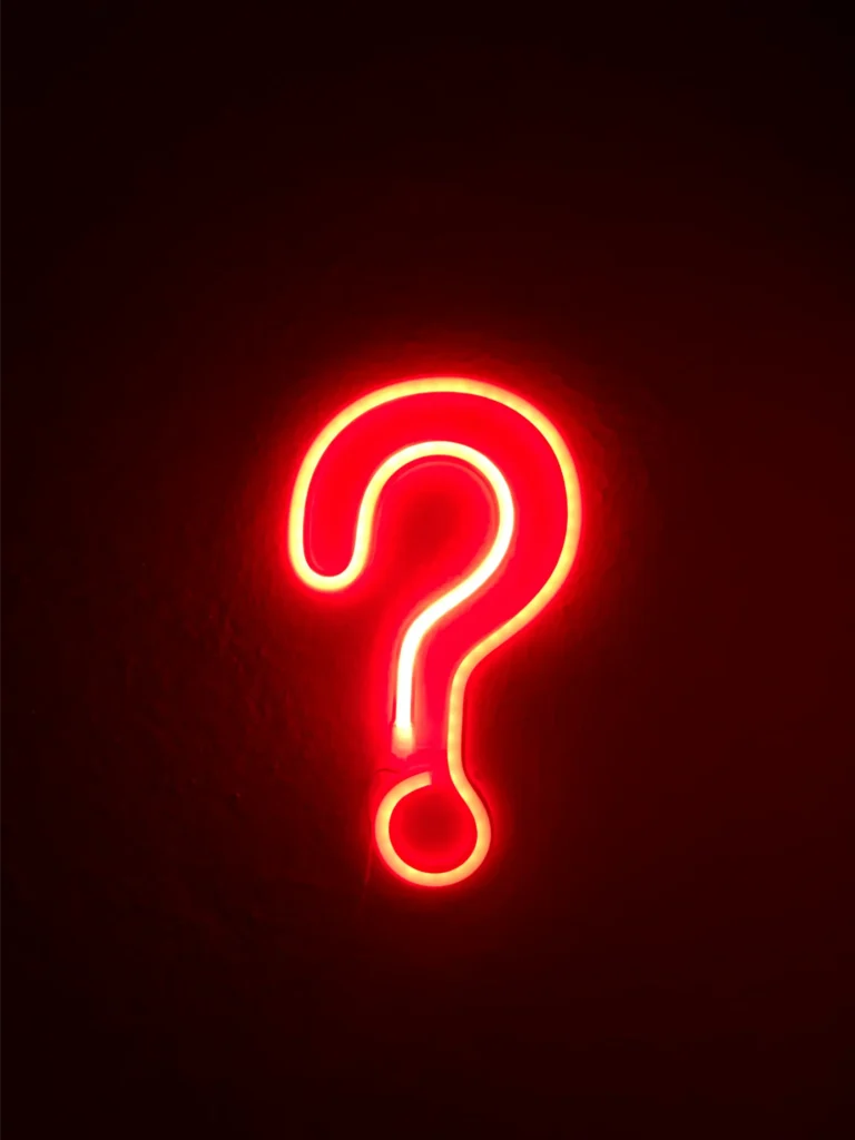 Image of a glowing question mark.